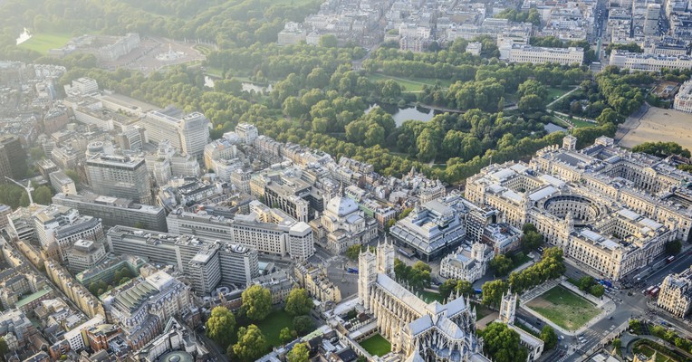 Virtual AI Risk Officer versus a full-time hire: an aerial view across Westminster and its parkland